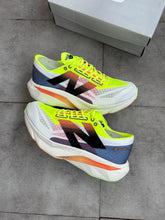 New Balance Fuelcell Rebel V4 - Verde e Laranja
